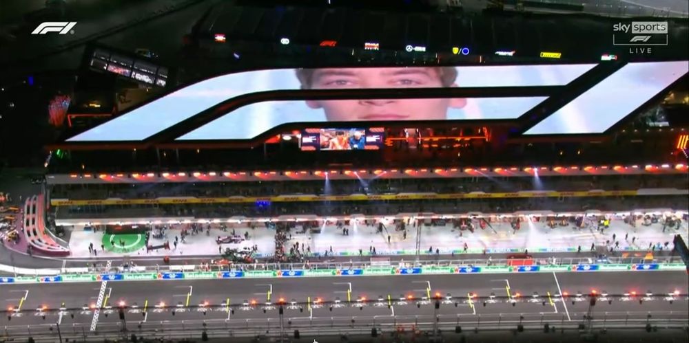 Formula 1 Vegas Grand Prix signage in the shape of the F1 log displaying George Russell's face