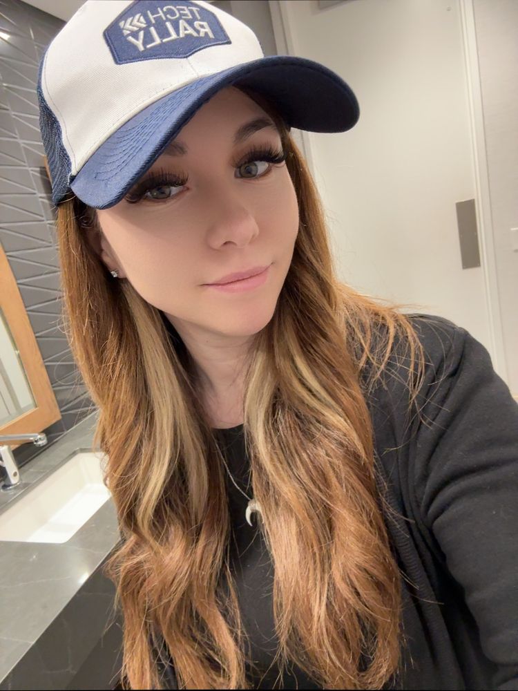 Wearing a Dell swag hat