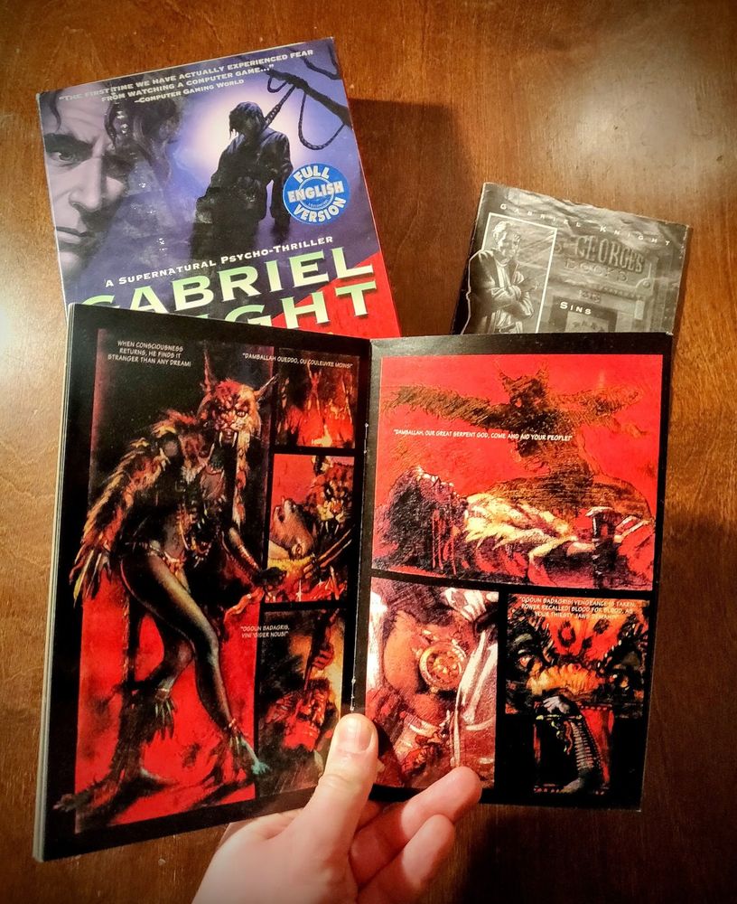 Photo of the original Gabriel Knight game box, manual and the graphic novel that game with the game.