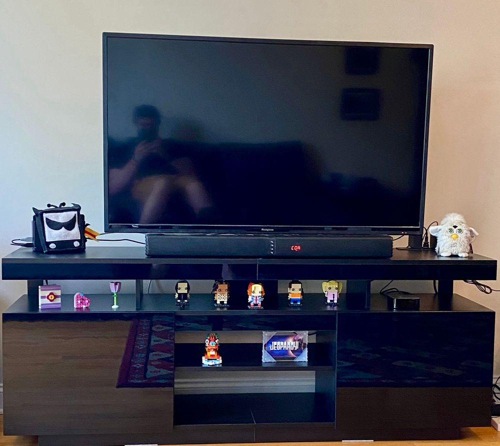 TV stand with tastefully add knick knacks