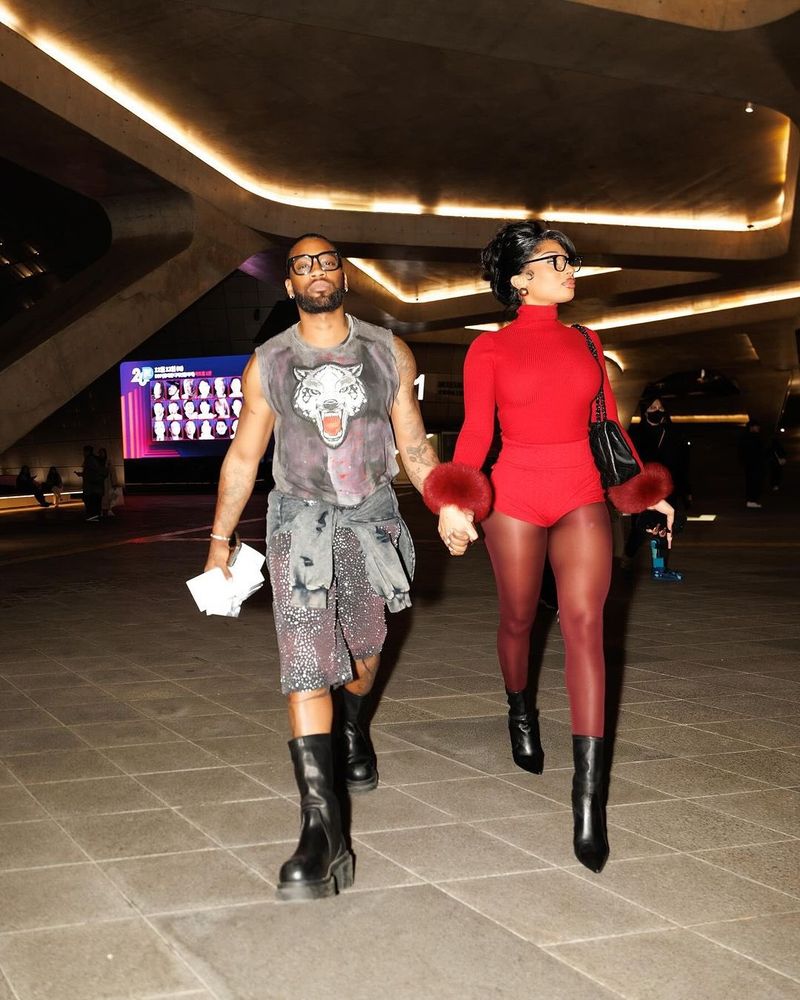 Megan thee stallion and Kellon walking and holding hands