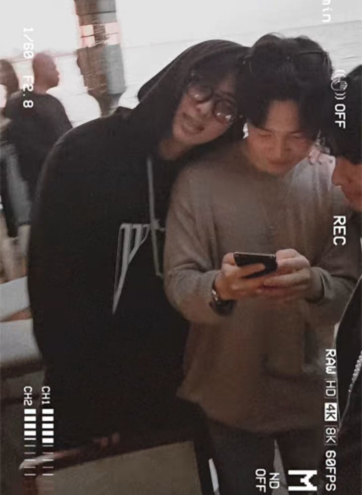 namjoon leaning down over jimins shoulder like a bf because thats what he is because the tannies are all dating jm and each other but lets focus on minjoon rn bc they are hard launching every other day 