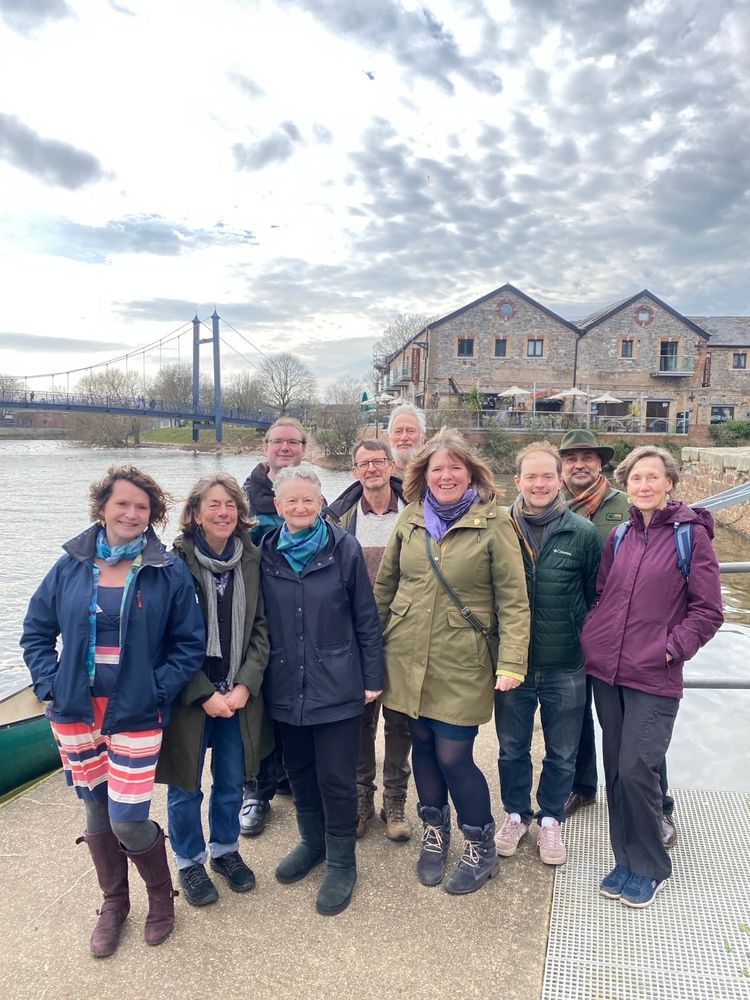 Green peer Jenny Jones (third from left, front) with Green Party councillors and members and supporters (ten people in all) standing by the River Exe at Exeter Quay.