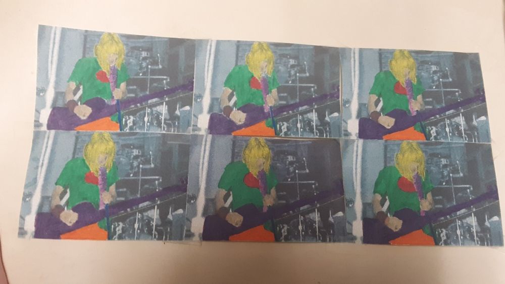 A colored in collage of Kim Gordon of Sonic Youth playing bass live, Warhol style (kinda)