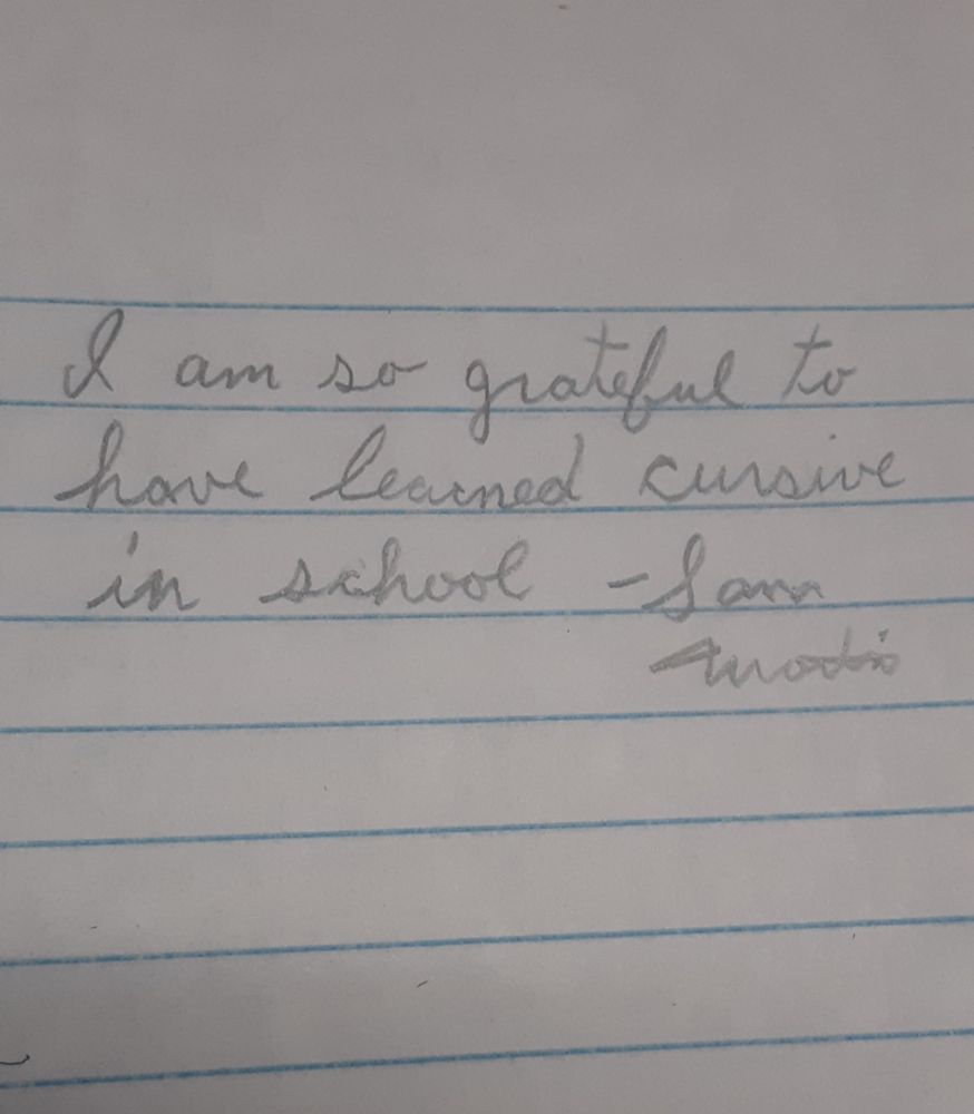 Written out in cursive: "I am so grateful to have learned cursive in school - Sam Martin
