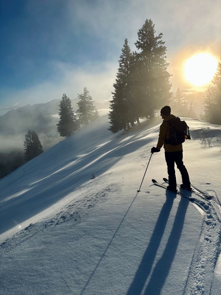 Me this morning after a ski tour up a mountain, about to ride down