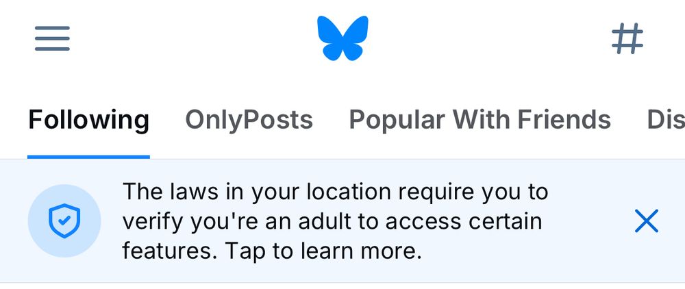A screenshot of the Bluesky app, with a banner at the top:

The laws in your location require you to verify you're an adult to access certain features. Tap to learn more.