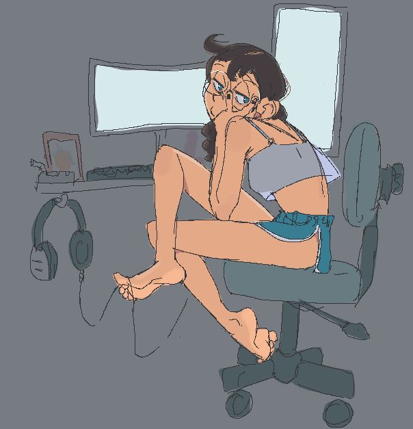 girl with shorts, camisole, and braided hair sitting at listlessly at her computer desk 