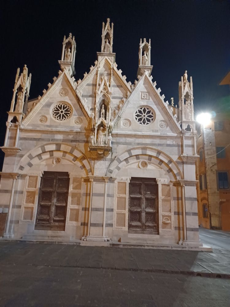 A tiny marble chapel, with lots of spiky gothic detailing 
