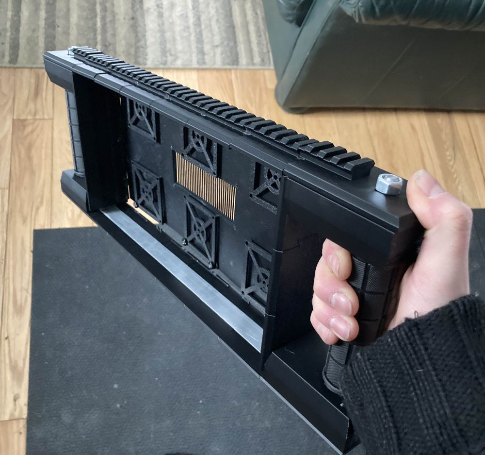 one-handed hold of the cyberdeck case