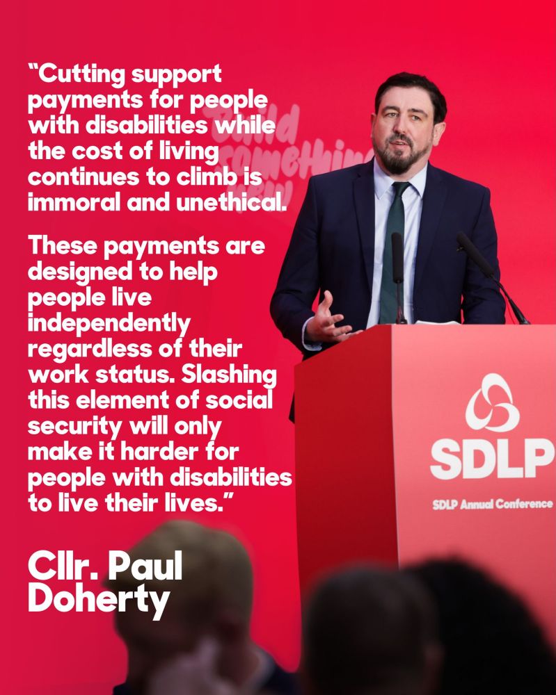 Paul Doherty speaking at event with text outlining opposition to UK govt benefit cuts.