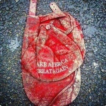 A red hat, smashed. 