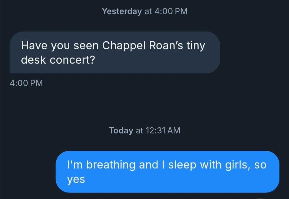 A DM exchange between two unknown people. The first person asks have you seen Chappel Roan's tiny desk concert? The second replies, I'm breathing and I sleep with girls so yes.