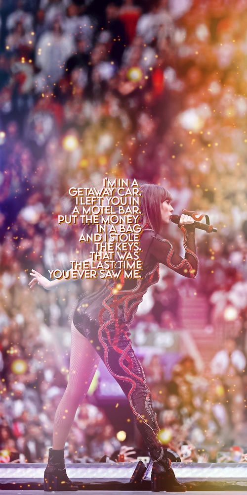 Taylor Swift preforming at The Eras Tour during the reputation set in the red snake bodysuit with Getaway Car lyrics wall