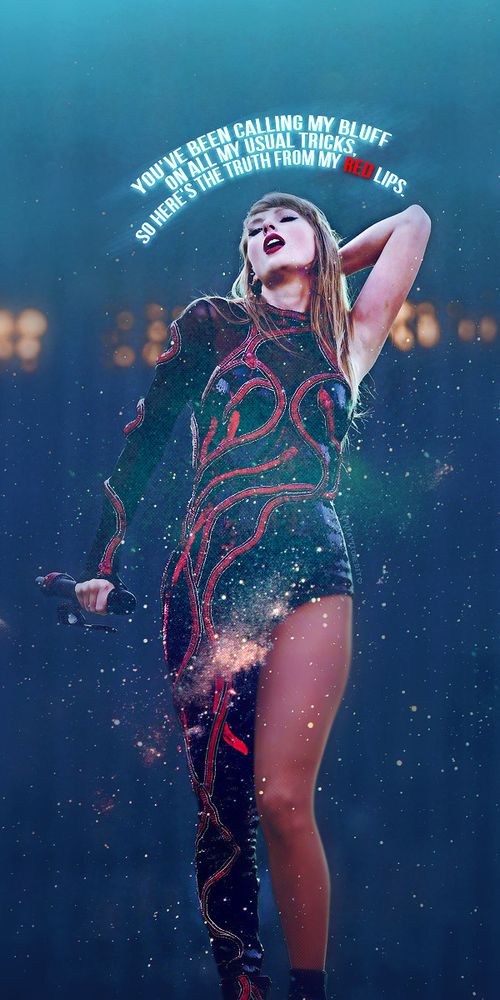 Taylor Swift preforming at The Eras Tour during the reputation set in the red snake bodysuit with End Game lyrics wall