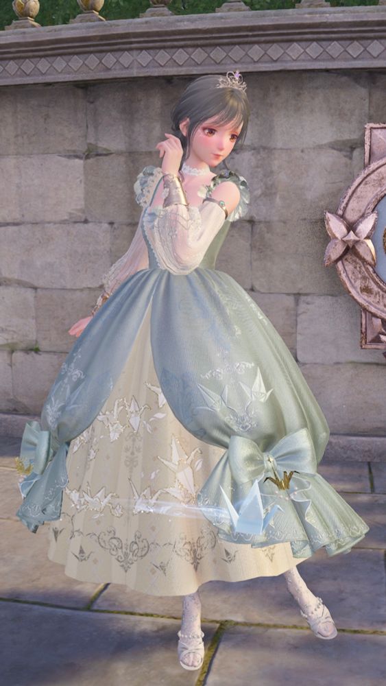Nikki posing in a light blue and white dress with bows and lace detailing. It’s a princess inspired outfit