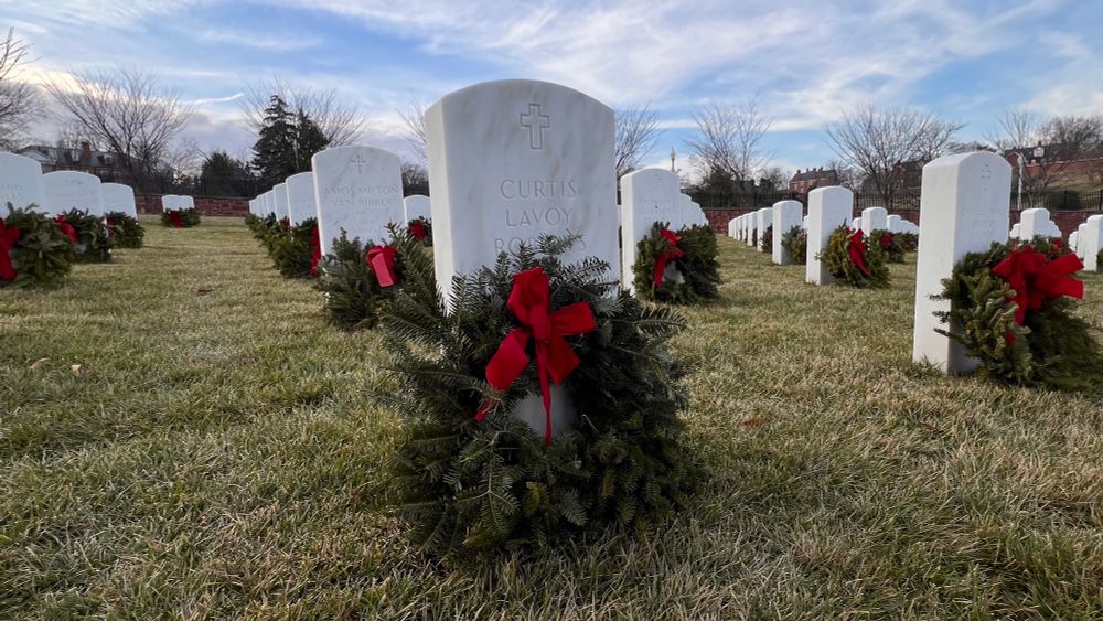 Christmas wreath on gravesite at Arlington National Cemetery. 