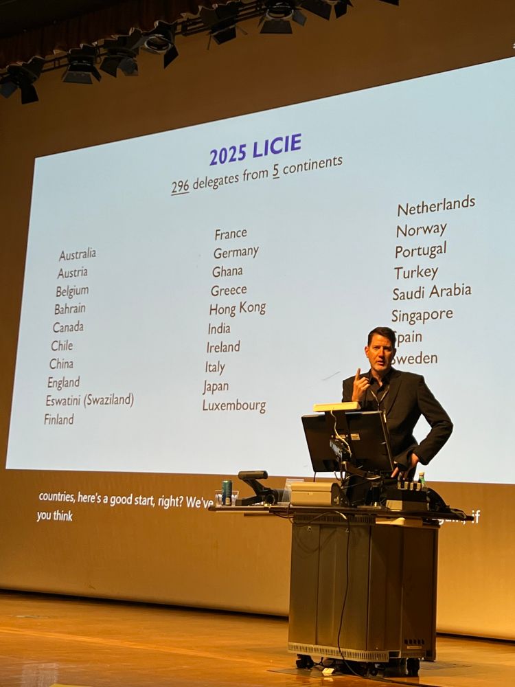 Prof. Zachary Walker at the stage 