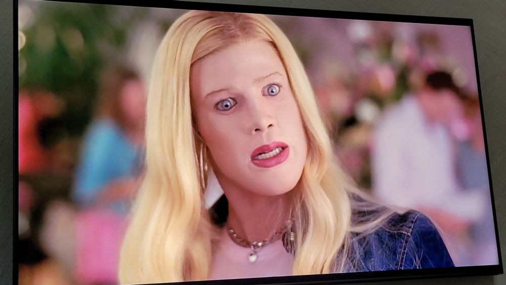 A Wayans in drag as a blonde socialite