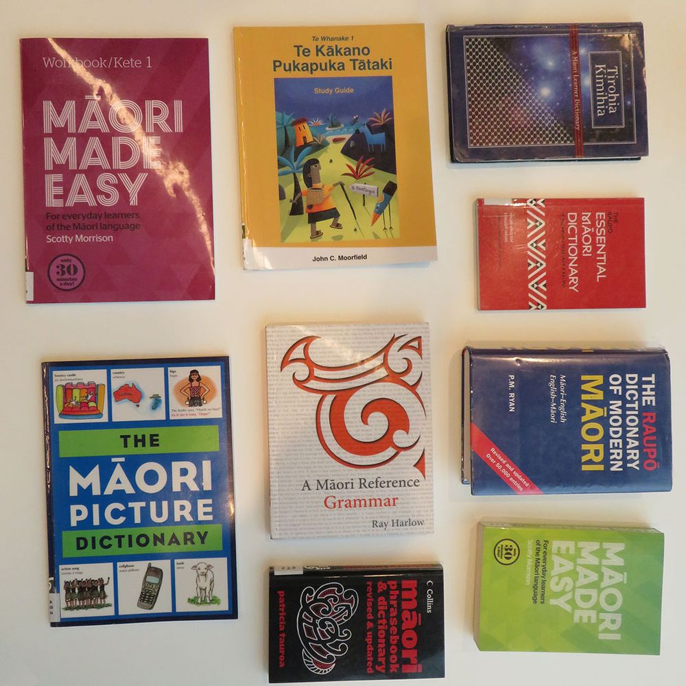 An assortment of Māori language learning titles including a picture dictionary, reference grammar and workbooks.