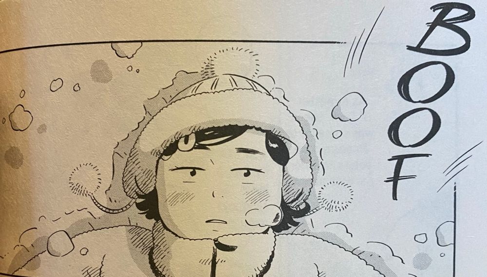 A young woman looks up as snow surrounds her. The sound effect of her falling into the show says “boof”.