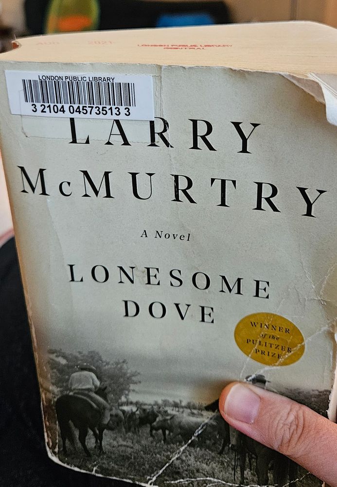 Paperback edition of Lonesome Dove by McMurtry.