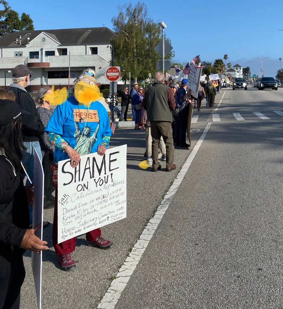Santa Cruz California protest on May Day 2025 Image shows￼protesters with signs