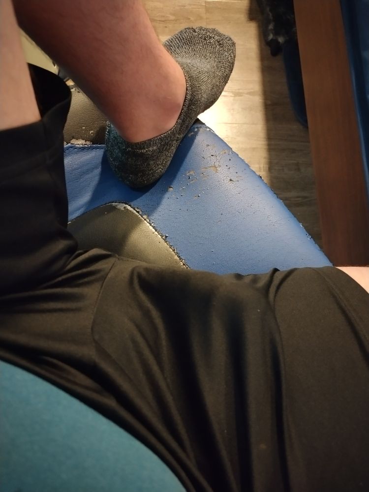 Just a crotch shot showing my boner under my black shorts. 