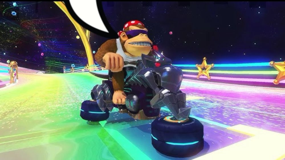 A picture of famous Mariokart character "Funky Kong" on Rainbow Road with a small speech bubble pointing upwards to indicate he is the one saying something.