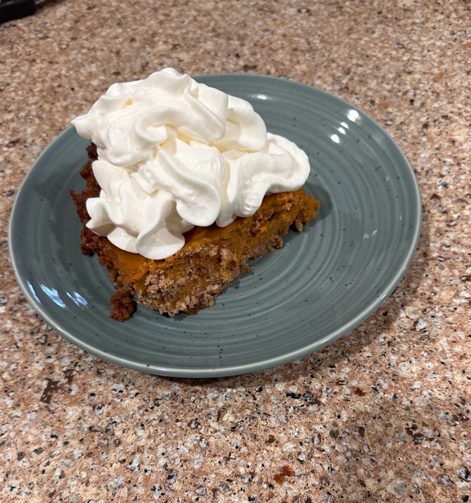 Pumpkin Pie with whipped cream 
