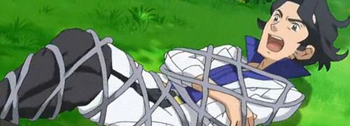 Professor Sycamore from the Pokemon XY anime tied up in a net.