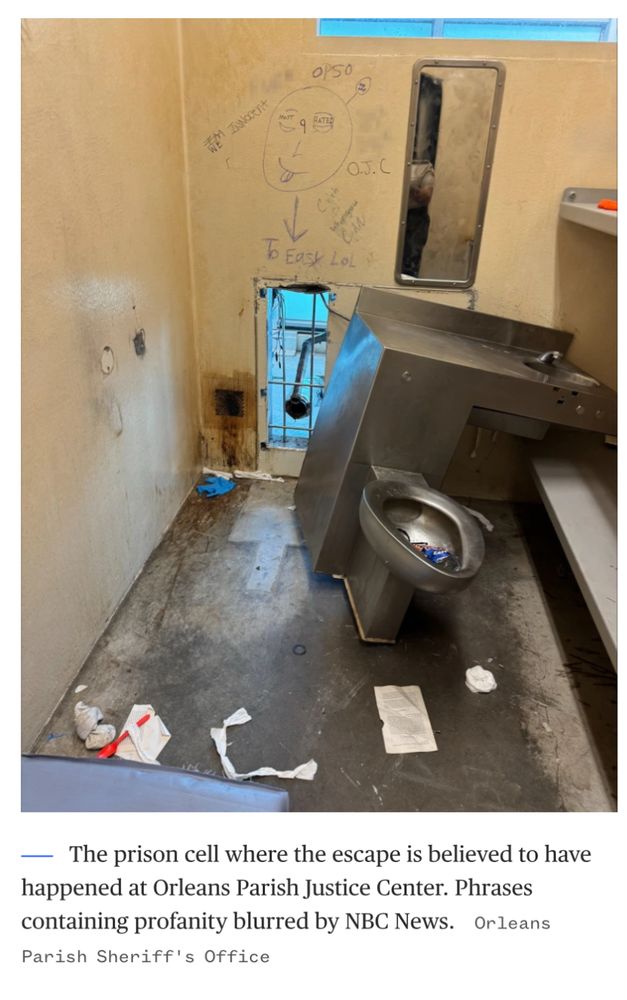 A hole in the prison’s wall with “to easy lol” written over it 