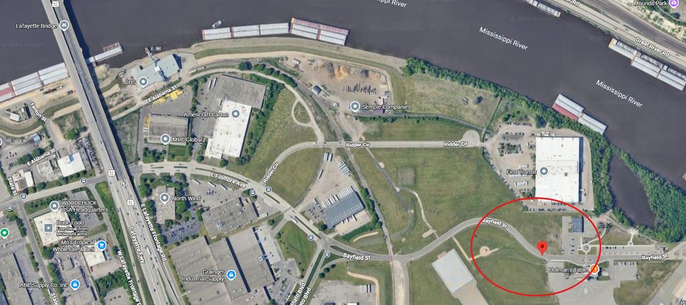 Satellite view of the location next to the Saint Paul airport, next the end of a runway.
