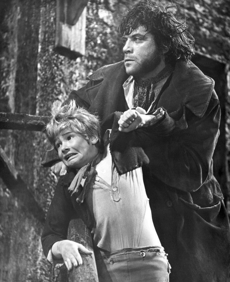 Oliver Reed as Bill Sykes, well known East End folk hero and protector of the downtrodden masses.