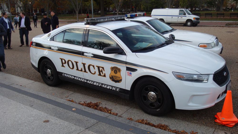 American police car with Secret Service logo.