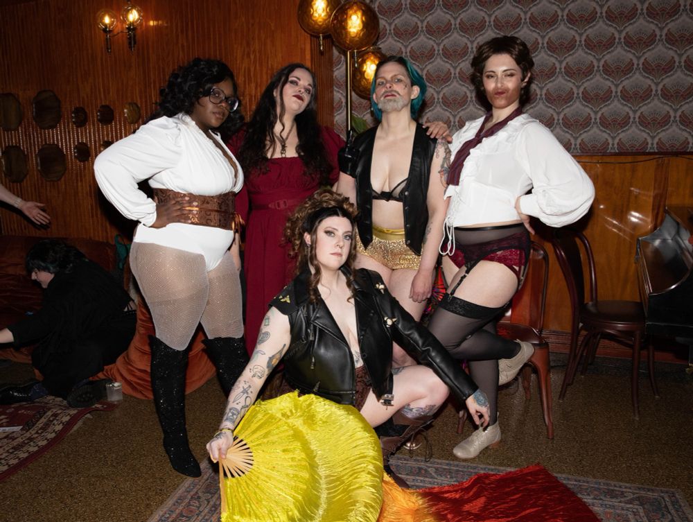 Group photo of Shea as Jackie, Polly Amour as Evelyn, Polly Cocktail as Izzy, IBrat as Lucius, and Lizzy Leo as Ed 