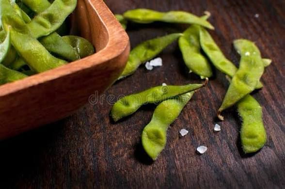 I have eaten the soybeans that were in the US

and which you were probably saving for selling to China

Forgive me 
They were delicious 
So soy
And so beany 

Photo of empty edamame shells in a wooden bowl and on a wooden table with coarse grains of salt 