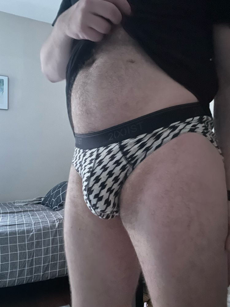 My bulge in patterned briefs  and me lifting up my shirt to expose my stomach 