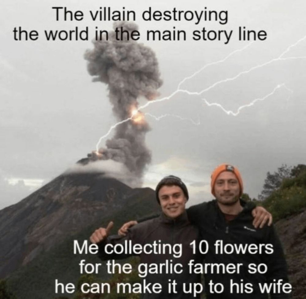 : Two people stand in front of an erupting volcano. Lightning strikes near the volcano, and a large plume of smoke rises from it. The image includes top text that reads, 