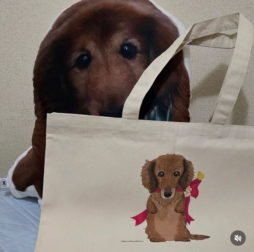 A dog Daina tote bag
