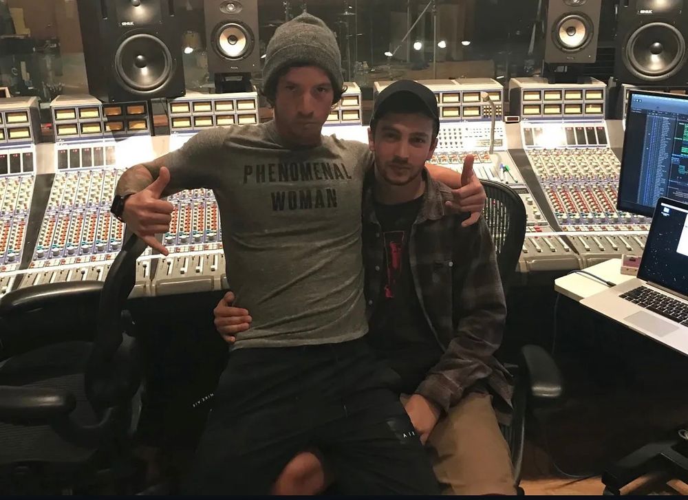 Josh sitting on Tylers lap