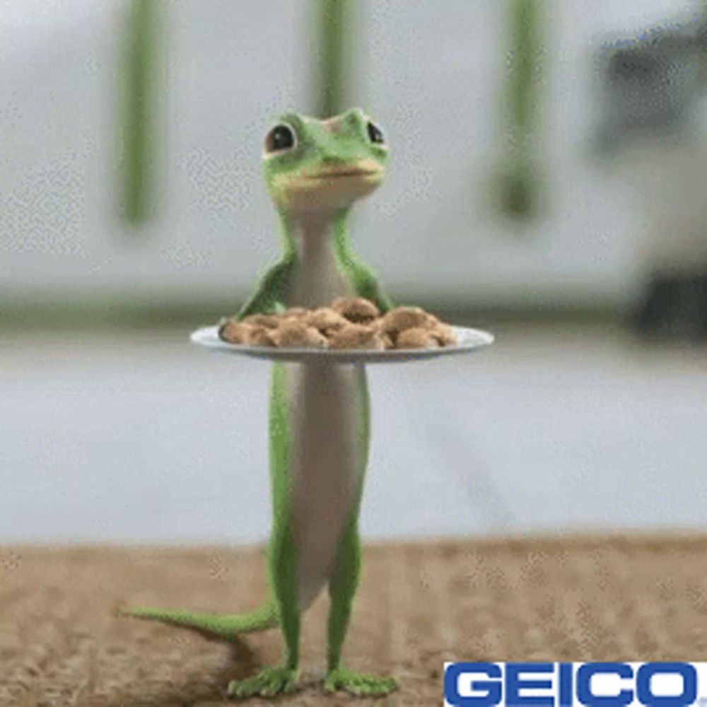 a geico lizard holding a plate of cookies on its head