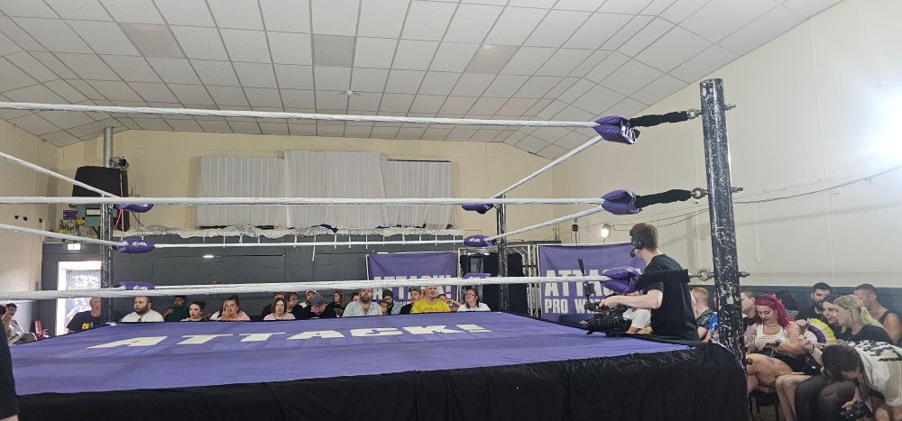 My vantage point from the second row at ATTACK Pro Wrestling "Rain in July".

This took place in the "Bingo Hall" at Cathays Community Centre in suburban Cardiff. Considered one of the most well-known venues in the whole of Wales, this has been ATTACK Pro Wrestling's home venue more or less since the company's inception in 2011.