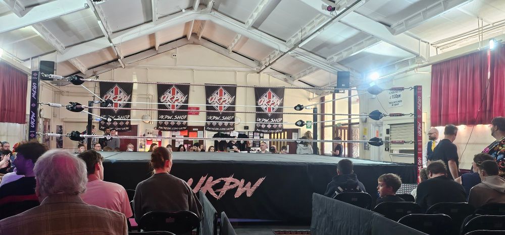 The ring at the Falconwood Community Centre moments before UKPW's inaugural Invictus Cup event. In the titular event, eight wrestlers with less than a couple of years experience in UKPW competed in four semi-finals, with the winners advancing into a four-way elimination final.