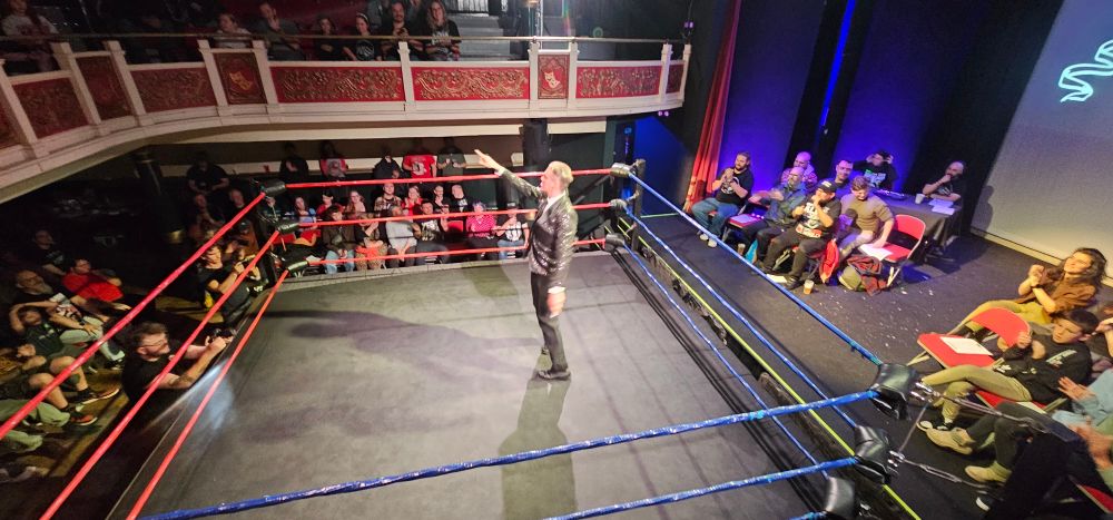 The vantage point from the front row of the balcony of the Y Theatre in Leicester. Ring announcer G-Man warms up the crowd moments before Crash! Bang! Wallop! What A Wrestling Show! begins...