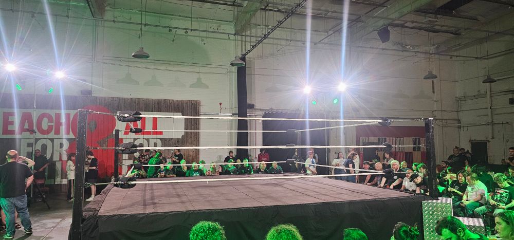 Moments before the first of two EVE events at the Big Penny Social in August, "Hit Me With Your Best Chop", featuring the first Falls Count Anywhere Match in the promotion's history between EVE Champion Nightshade and top contender Alexxis Falcon. 