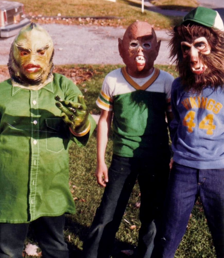 An old photo of kids in Halloween masks