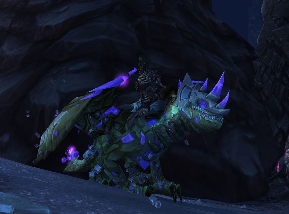 The Phosphorescent Stone Drake mount from world of warcraft. It is a purple gemmed dragon.