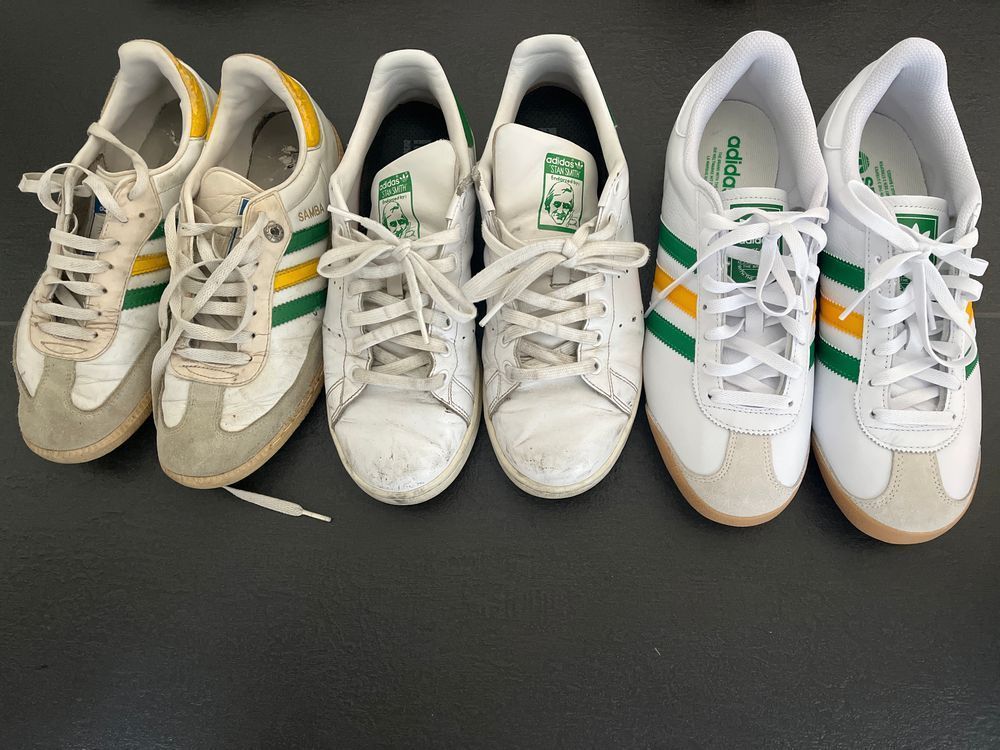 3 pairs of white adidas sneakers 