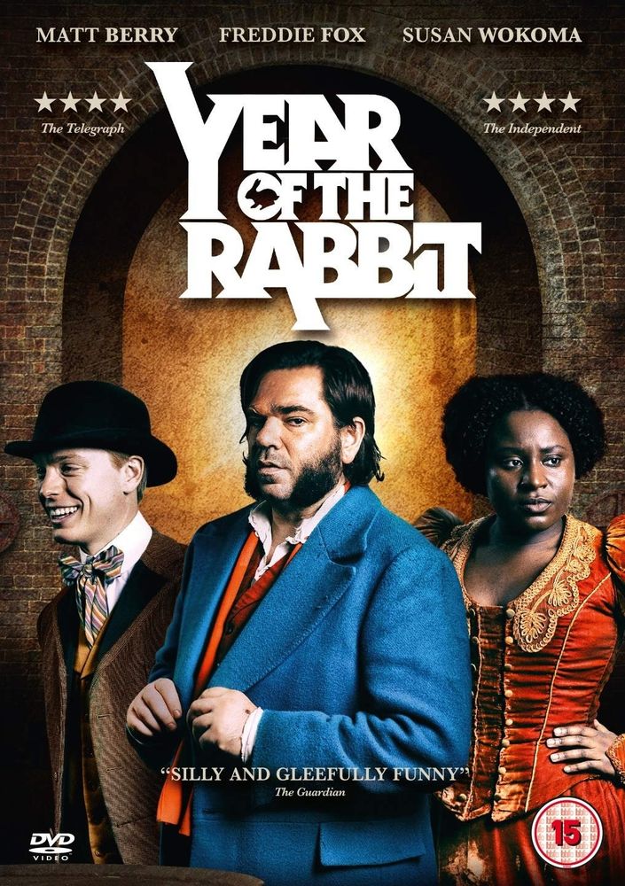 Poster for the Channel 4 period comedy TV show, Year of the Rabbit, featuring the actors Matt Barry, Freddie Fox and Susan Wokoma.